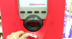 cvs card at the red machine