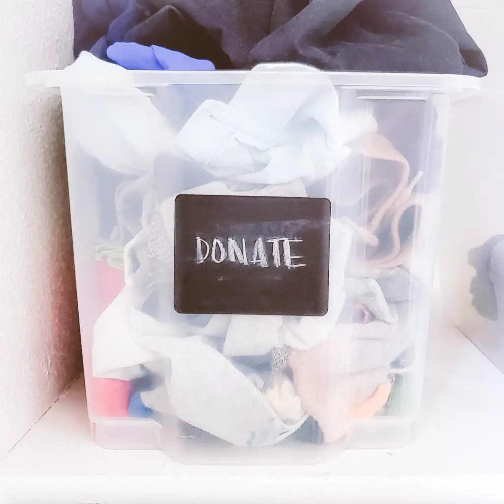 declutter and organize kids closet hack - create a dedicated donate bin