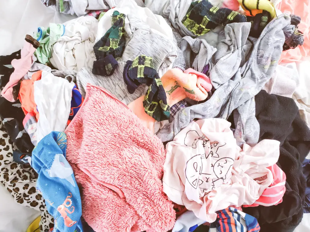 Declutter and organize kids closet laundry
